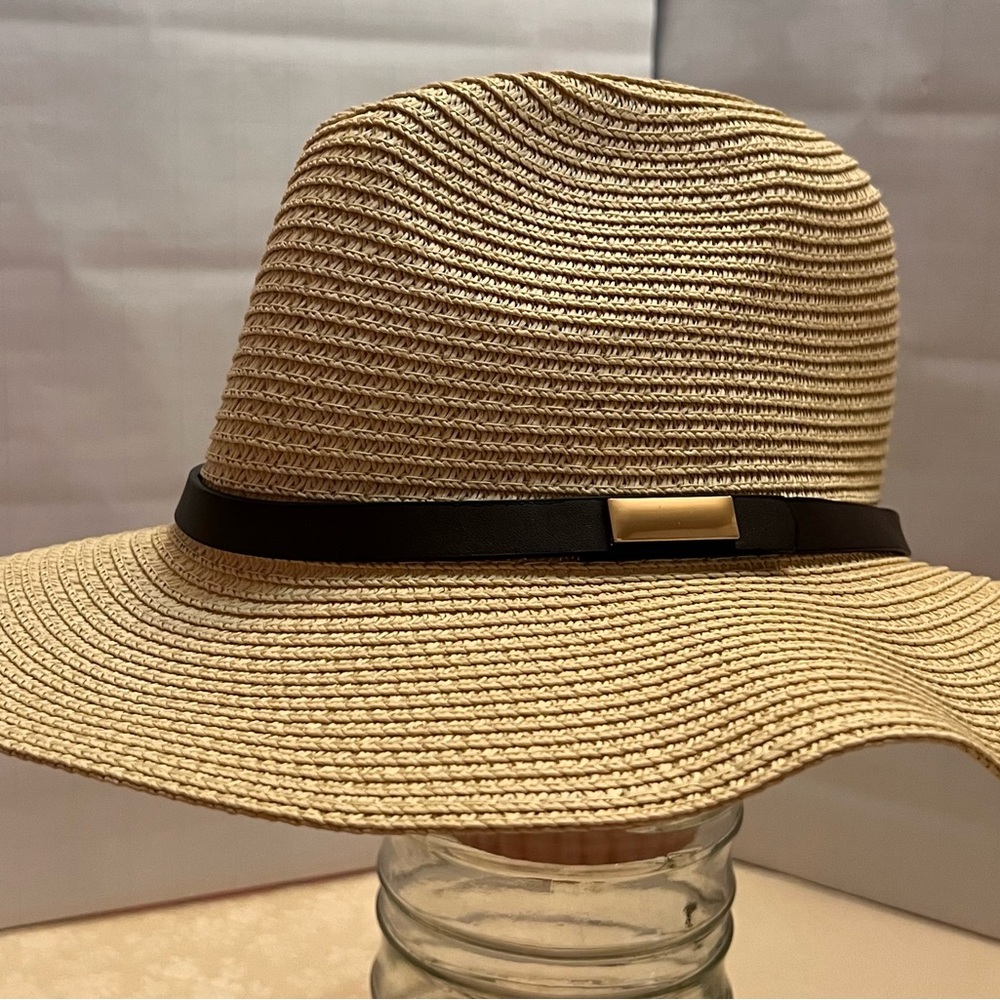 Women’s natural beach hats. One with ornamental detail and one without.